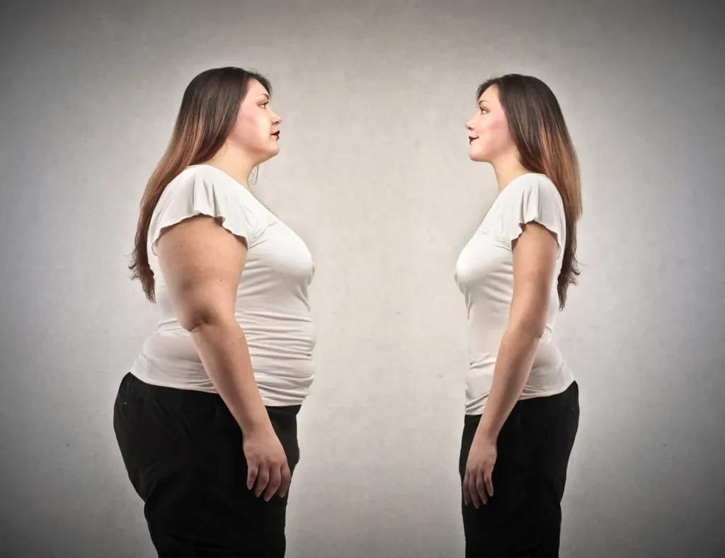 Two women standing face to face.