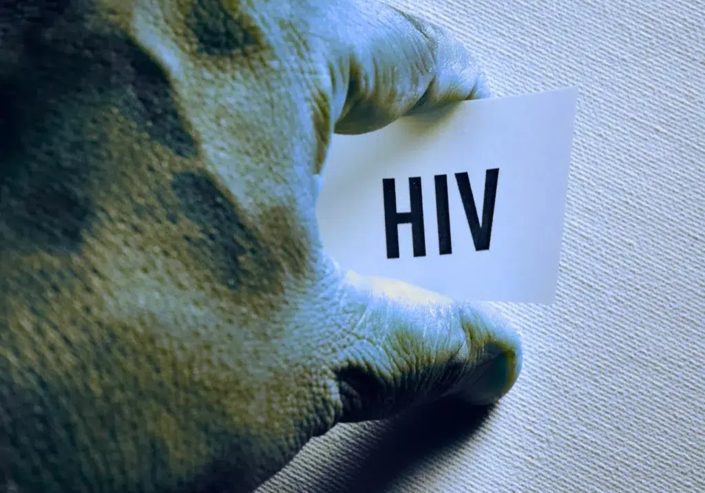 holding HIV tag